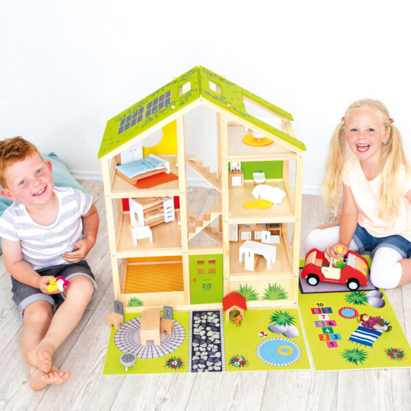 Kinder spielen mit Vier Jahreszeiten Haus XL Set