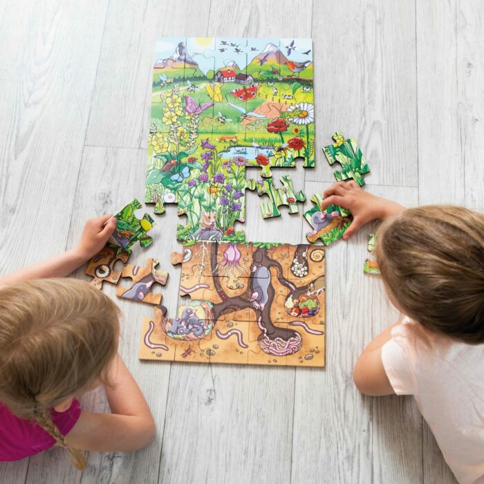 Kinder machen Bodenpuzzle Blumenwiese